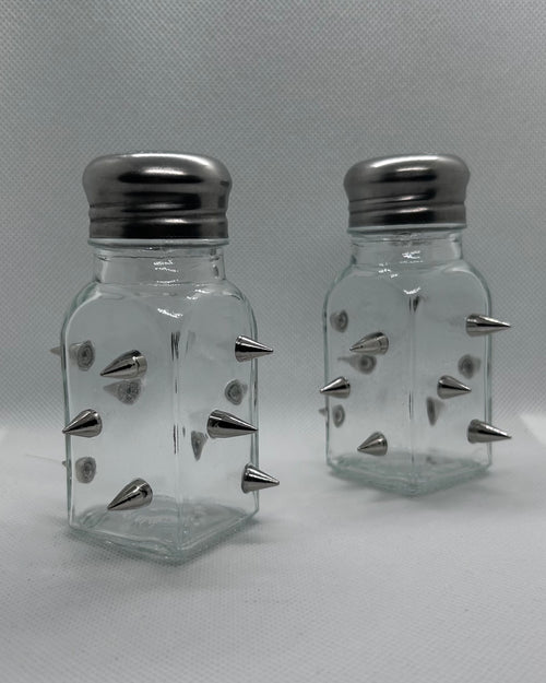 Empty salt and pepper shaker with spikes 