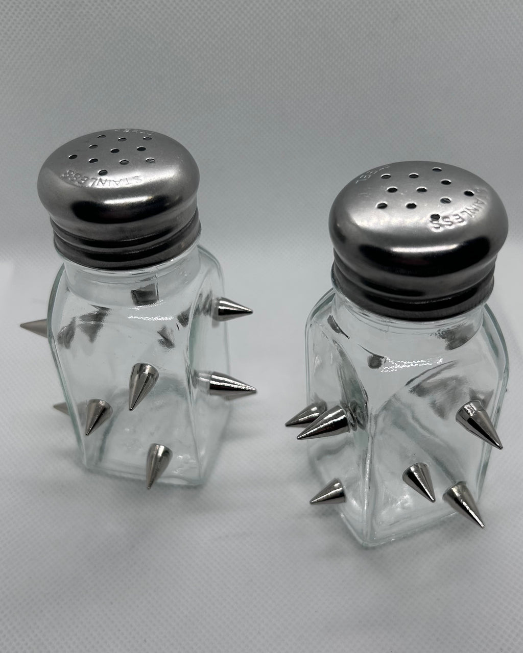 Empty salt and pepper shaker with spikes 