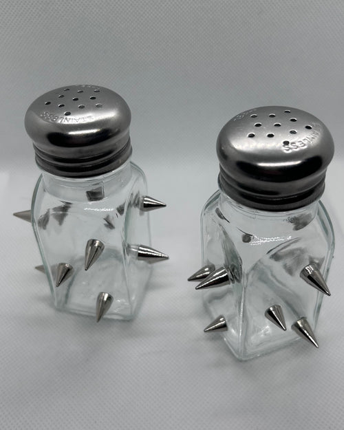 Empty salt and pepper shaker with spikes 