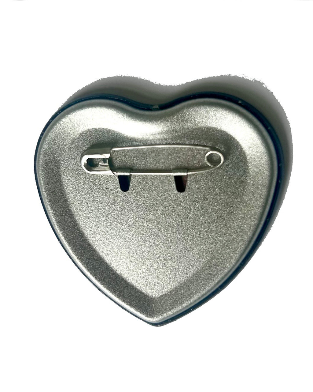 Heart-shaped metal pin with a central pin on a white background