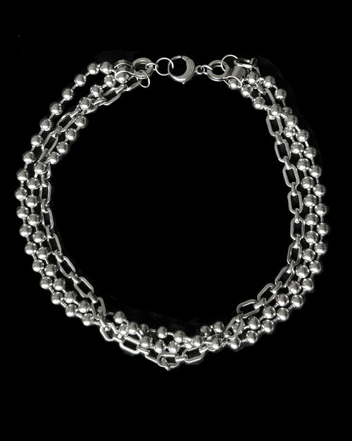 Silver necklace with three chains 
